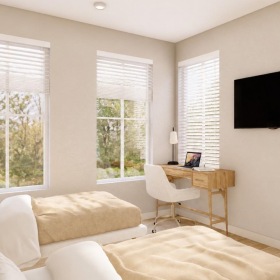 a living room with a tv and couches